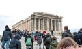 Athens, Greece - February 23, 2019: Tourists visit Parthenon temple at the Acropolis in Athens. View on the side of the western Royalty Free Stock Photo