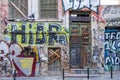 Athens, Greece. Graffiti on ruined wall and door at Monastiraki