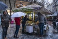 Street vendor of bread and puff pastry at night in Athens, Greece