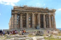 ATHENS, GREECE - JULY 18, 2018: Parthenon temple under renovation with tourists visiting the Acropolis in Athens, Greece