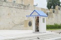 Presidential Guard outside Presidential Mansion and wall with greek character signs guards Tomb of Unknown Soldier