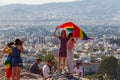 Girls holding flag on Athens Pride 2018 day being photographed b Royalty Free Stock Photo