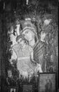 A monochromatic religious icon of the Virgin Mary carrying the baby Jesus inside the cave church at Penteli mountain, Greece