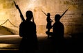 Athens, Greece - May 11, 2016: Figure silhouette of guards Evzones at night in front of the Monument of the Unknown Soldier