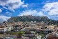 Athens, Greece. Acropolis rock and Monastiraki square, blue sky background, sunny day downtown Royalty Free Stock Photo