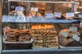 Traditional Greek snacks and pastry products on a shop window in Athens, Greece