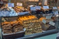 Traditional Greek snacks and pastry products on a shop window in Athens, Greece