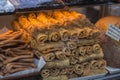 Traditional Greek snacks and pastry products on a shop window in Athens, Greece