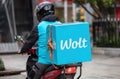 Athens, Greece. Nov 12, 2020. Wolt courier with motor scooter, rear view. Food delivery service