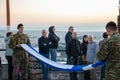 Athens, Greece - November 30 2019: Two soldiers folding greek flag