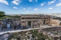 Tourists near the Acropolis Propylaea with Athens panorama background