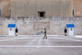 Athens, Greece. Presidential guards with a coronavirus protective mask infront of Greek Parliament building