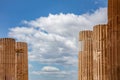 Athens, Greece. Propylaea columns in the Acropolis, blue cloudy sky in spring sunny day Royalty Free Stock Photo