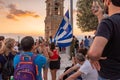 Military ceremony for the lowering of the Greek flag at sunset at Lycabettus Hill in Athens Royalty Free Stock Photo