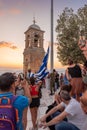 Military ceremony for the lowering of the Greek flag at sunset at Lycabettus Hill in Athens