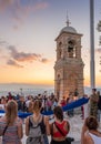 Military ceremony for the lowering of the Greek flag at sunset at Lycabettus Hill in Athens Royalty Free Stock Photo