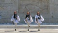 ATHENS, GREECE- SEPTEMBER, 4, 2016: three guards walk towards the camera at the parliament in athens, greece