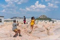 ATHENS, GREECE - SEPTEMBER 16, 2018: Young afro american couple traveling in ancient Athens, Greece