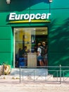 Athens, Greece - Tuesday 25th October 2022: Tourists hiring a car in a showroom in a city centre.