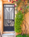 Athens Greece, vintage metal and glass house door, anafiotika picturesque neighborhood under acropolis Royalty Free Stock Photo