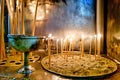 Athens Greece. Votive candles inside the orthodox church Ekklisia Panagia Grigorousa Agii Taxiarches ke Agios Fanourios