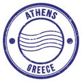 ATHENS - GREECE, words written on dark blue postal stamp Royalty Free Stock Photo