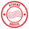 ATHENS - GREECE, words written on red postal stamp Royalty Free Stock Photo