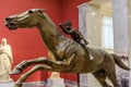 Ancient bronze statue of horse and young jockey in National Archaeological Museum of Athens, Greece Royalty Free Stock Photo