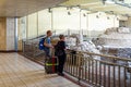 Tourists look at Ancient ruins inside Monastirion Monastiraki metro station in Athens city center, Greece