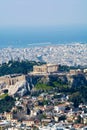 Athens in spring, view from hill, cityscape with Acropolis, streets and buildings, ancient urbal culture
