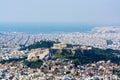 Athens in spring, view from hill, cityscape with Acropolis, streets and buildings, ancient urbal culture