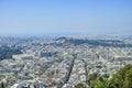 Athens in spring, view from hill, cityscape with streets and buildings, ancient urbal culture