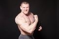 The athlete bodybuilder drinks water out of a Shaker Royalty Free Stock Photo