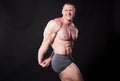 The athlete bodybuilder shows his muscles after sports Royalty Free Stock Photo
