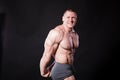 The athlete bodybuilder shows his muscles after sports Royalty Free Stock Photo