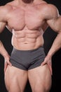 The athlete bodybuilder shows his muscles after sports Royalty Free Stock Photo