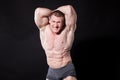 The athlete bodybuilder shows his muscles after sports Royalty Free Stock Photo