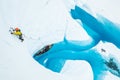 Athlete climbing out of a boat on a lake on top of the ice of the Matanuska Glacier Royalty Free Stock Photo