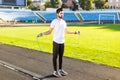 Athlete indian man doing exercize at the stadium Royalty Free Stock Photo