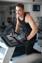 Athlete exercising on a stationary bike Royalty Free Stock Photo