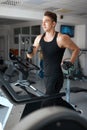 Athlete exercising on a stationary bike Royalty Free Stock Photo