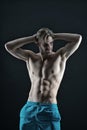 Athlete with fit body in shorts. Sportsman with torso and chest. Man with six pack and ab muscles. Training and Royalty Free Stock Photo
