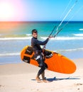 Athlete going to kite surfing training Royalty Free Stock Photo