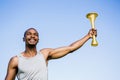 Athlete holding a fire torch