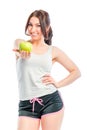 Athlete holds a green apple