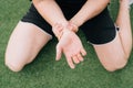 The athlete holds his hand clos up. Break your wrist in training. The concept of an accident injury while in sport