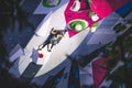 Athlete jumping on the final route of the IFSC lead world cup Royalty Free Stock Photo