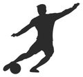 Athlete kicking football ball. Soccer player silhouette