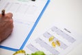 Athlete makes a diet plan for proper nutrition Royalty Free Stock Photo