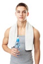 Athlete man holding a water bottle Royalty Free Stock Photo